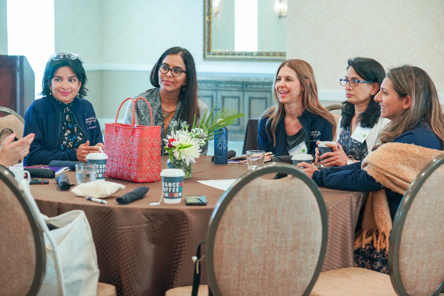 Small group of women physicians in cohort discussion
