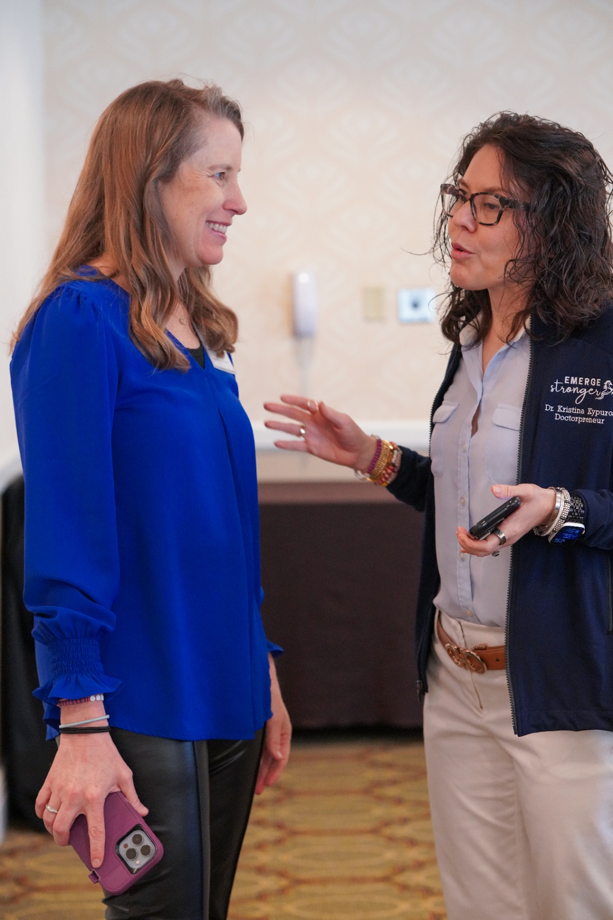 Dr. Sears in conversation with a physician leader